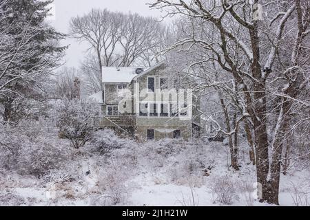 Vacant home in snow covered winter landscape Stock Photo