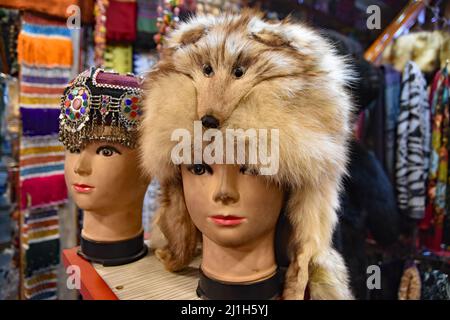 Kabul, Afghanistan. 22nd Feb, 2022. (2/22/2022) Kabul, Afghanistan, February March 2022. Souvenir shop. Fur hat made from fox. fashion, endangered species. (Photo by Teun Voeten/Sipa USA) Credit: Sipa USA/Alamy Live News Stock Photo