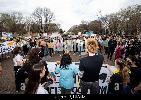 Washington DC, USA. 25th Mar, 2022. Protesters hold placards expressing their opinion at a Global Climate Strike demonstration. Credit: SOPA Images Limited/Alamy Live News Stock Photo