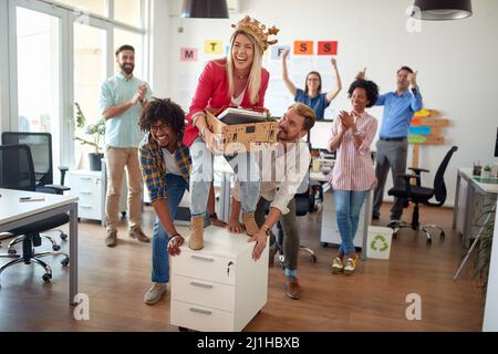Group of casual corporate coworkers having fun in the office Stock Photo