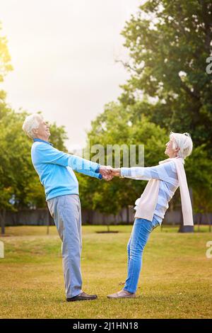 They can always depend on each other for support. Shot of a senior couple enjoying the day together in a park. Stock Photo