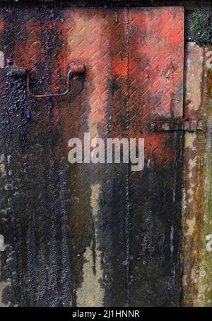 Old dark and dirty red and cream concrete wall texture for background and wallpaper Stock Photo