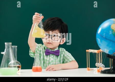 Pupils in chemistry class Stock Photo