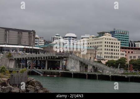 New Zealand, Wellington - January 11 2020: the view of city to sea bridge with heavy clouds on background on January 11 2020 in Wellington, New Zealan Stock Photo