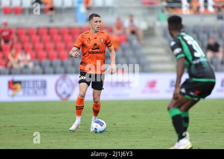 Redcliffe, Australia. 26th Mar, 2022. Scott Neville of the Roar is seen with the ball Credit: News Images /Alamy Live News Stock Photo