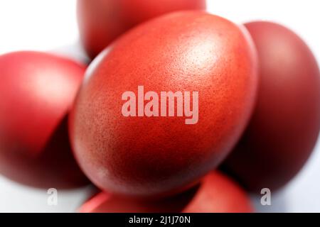 Red Easter eggs. Top view. Coloring the eggs according to the old eco-friendly method with natural dye onion husks Stock Photo