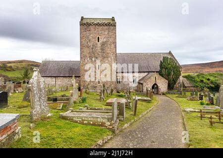 St Cenydd’s Church, Llangennith is a 12th century church on the site of a 6th century llan, or churchyard, which retains the original circular footpri Stock Photo