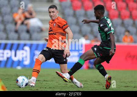 Redcliffe, Australia. 26th Mar, 2022. Scott Neville of the Roar passes the ball Credit: News Images /Alamy Live News Stock Photo