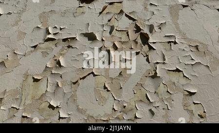 Cracked paint on the wall. Painted wall with peeled structure and peeling, background for template. White peeling paint on the wall. Stock Photo