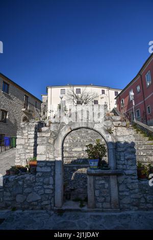 An ancient stone arch in a street of Fontanarosa, a small village in the province of Avellino, Italy. Stock Photo