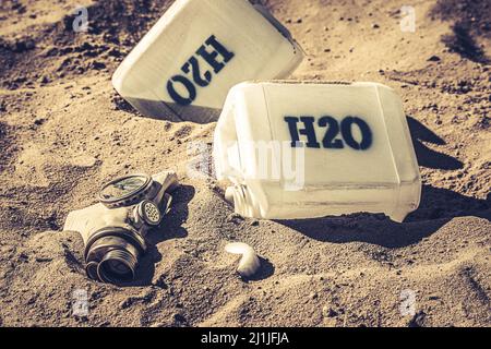 Unclean water cans as problem with water shortage. Empty plastic water cans in a desert area. Stock Photo