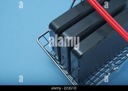A stack of hard drives in a basket. Stock Photo