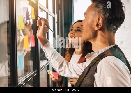 Business people work together as teamwork and partner with sticker Stock Photo