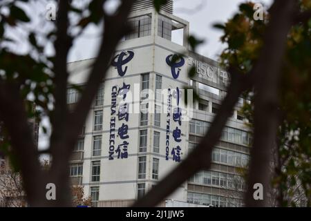 FUYANG, CHINA - MARCH 26, 2022 - A China Telecom logo is seen outside the Office building of China Telecom Communications Group in Fuyang, Anhui Provi Stock Photo