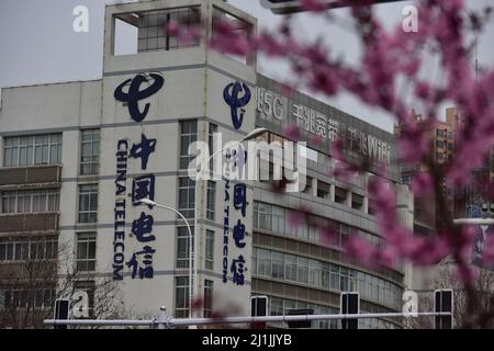 FUYANG, CHINA - MARCH 26, 2022 - A China Telecom logo is seen outside the Office building of China Telecom Communications Group in Fuyang, Anhui Provi Stock Photo