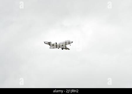 A passenger airplane lands at Pearson international airport in Toronto Canada in cloudy weather Stock Photo