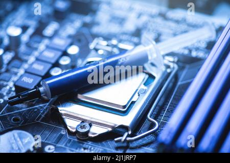 Thermal compound for the CPU in the PC Stock Photo