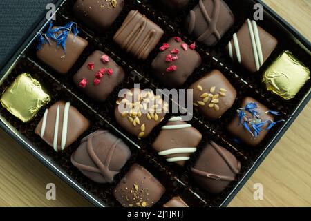 Box of delicious handmade chocolates. Stock Photo