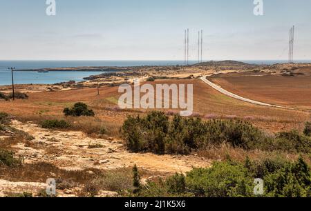 Landscape road to Cape Greco peninsula with radar station of the British military base, Cyprus. It is mountainous peninsula with a national park, rock Stock Photo