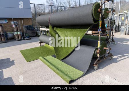 Artificial grass on sale in garden centre store, Wales, UK Stock Photo