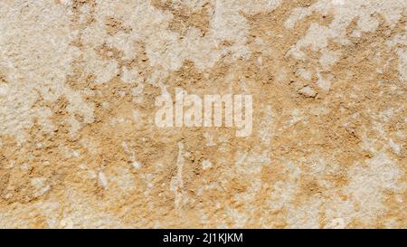 Old marble texture for background. Beige stone texture with spots and cracks. Cracked vintage wall background Stock Photo