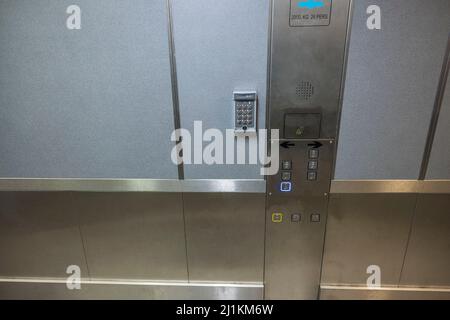 Close up view of control panel of elevator cabin. Sweden. Stock Photo