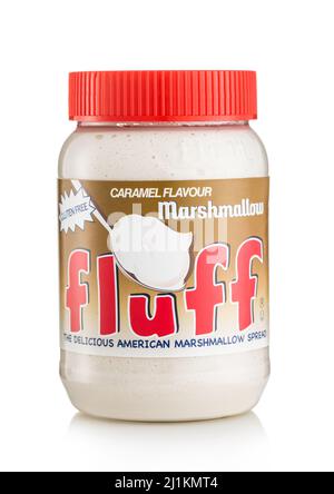 LONDON,UK - MARCH 05,2022: Fluff Marshmallow with caramel flavour on white. Delicious american marshmallow spread Stock Photo