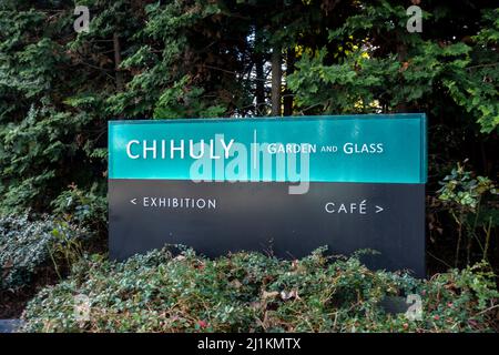 Seattle, WA USA - circa March 2022: Angled view of the entrance sign for Chihuly Garden in the downtown area near the Space Needle. Stock Photo