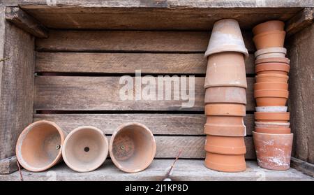 stacks of traditional clay or terracotta flowerpots,good background image. Stock Photo