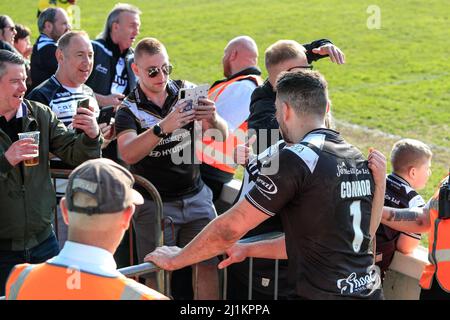 Featherstone, UK. 26th Mar, 2022. Fans flock to have their picture with Jake Connor #1 of Hull FC after the game in Featherstone, United Kingdom on 3/26/2022. (Photo by James Heaton/News Images/Sipa USA) Credit: Sipa USA/Alamy Live News Stock Photo