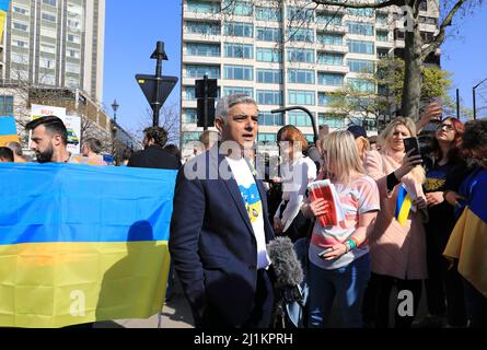 London, UK. 26th March 2022.  Thousands joined a march in support of Ukraine on Saturday as Mayor Sadiq Khan urged the UK to do much more to help Ukainians. The march started on Park Lane, before heading to Trafalgar Square. Credit : Monica Wells/Alamy Live News Stock Photo