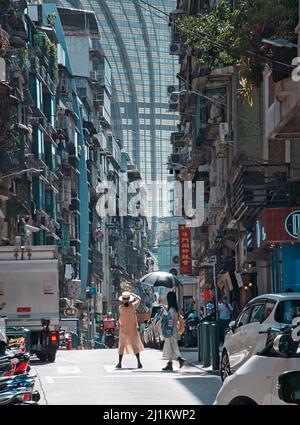 The tourists taking photos in front of Grand Lisboa Casino in Macau, China Stock Photo