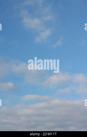 Hand throwing paper plane to blue sky, clear blue sky, sky background, paper plane in blue sky Stock Photo