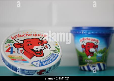 Istanbul,Turkey- March 09 2022: The Laughing Cow as known as La Vache Qui Rit brand cream cheese product, kitchen concept idea. Stock Photo