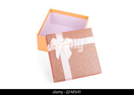 An open peach-colored gift box on a white background Stock Photo