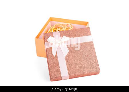 An open peach-colored gift box on a white background Stock Photo