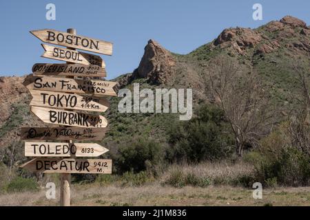 A signpost similar to the one on the TV show is displayed at the M*A*S*H site in Malibu Creek State Park in Calabasas, California USA Stock Photo