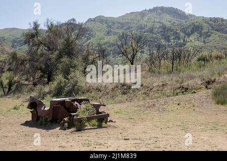 A burned out jeep sits at the M*A*S*H site in Malibu Creek State Park in Calabasas, California USA Stock Photo