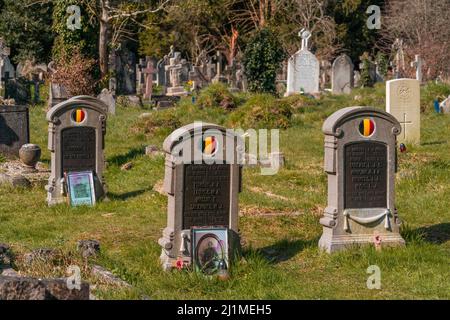The Great War or WW1, graves of fallen Belgian soldiers and memorabilia at the Old Cemetery on the Common in Southampton, England, UK Stock Photo