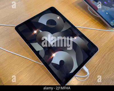 Paris, France - Mar 18, 2022: iPad Air 5 tablet during the sales launch at the Apple Inc. flagship store Stock Photo