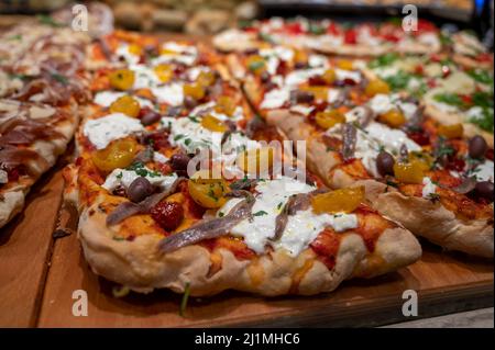 Fresh baked focaccia or pala romana pizza with vegetables and cheese in  bakery in Parma, Emilia Romania, Italy Stock Photo - Alamy