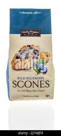 Winneconne, WI -20 March 2021: A package of Sticky fingers bakeries wild blueberry scones food mix on an isolated background Stock Photo