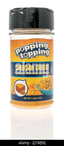 Winneconne, WI -20 March 2021: A package of popping topping cheddar cheese popcorn seasoning on an isolated background Stock Photo