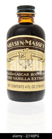 Winneconne, WI -24 March 2021: A bottle of Nielsen Massey pure vanilla extract on an isolated background Stock Photo