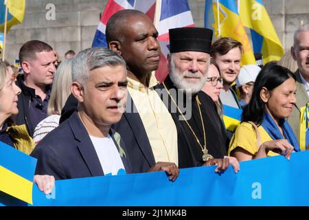 London, UK, 26th Mar, 2022.  Mayor of London Sadiq Khan and MP David Lammy joined tens of thousands gathered to show solidarity with Ukraine in a march and rally taking place Central London, organised by the European Movement and supported by the Mayor of London. One month after the Russian Invasion Ukrainian president Volodymyr Zelenskyy urged global protests to bring the war to an end. Credit: Eleventh Hour Photography/Alamy Live News Stock Photo