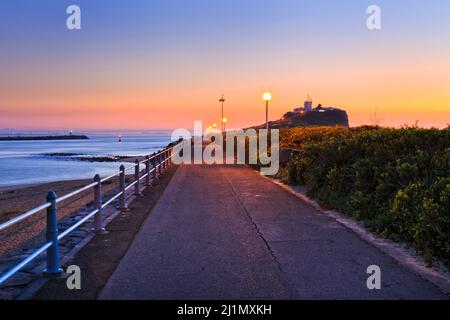 Delta of Hunter river in Newcastle city of Australia at sunrise near Nobbys head and lighthouse. Stock Photo