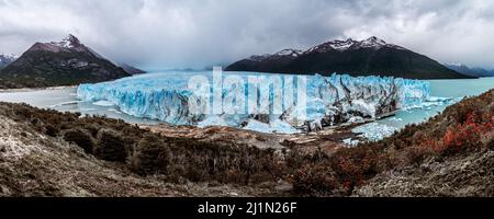 A dramatic photo of the landscape surrounding the world famous Perito Moreno glacier in Argentine Patagonia. Dark Cloudy adn rainy  weather Stock Photo