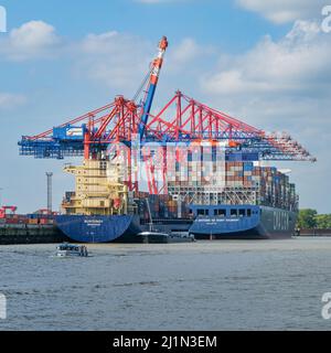 The container ship CMA CGM Antoine de Saint Exupery and Burgundy in the port of Hamburg, Germany Stock Photo