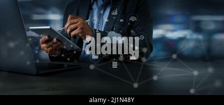 Two Businessman data analysis profit on the computer screen analyzing data marketing planning finance sales data Stock Photo