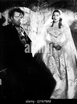 JOAN FONTAINE and ORSON WELLES in JANE EYRE (1944), directed by ROBERT STEVENSON. Credit: 20TH CENTURY FOX / Album Stock Photo